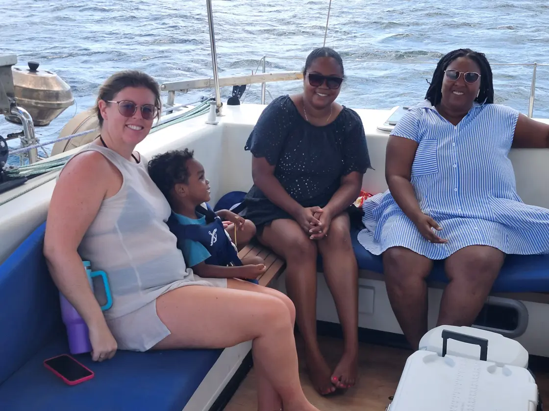 Guests relaxing together in the shaded cockpit